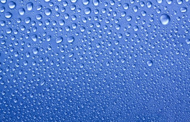 Drops of water on a blue surface