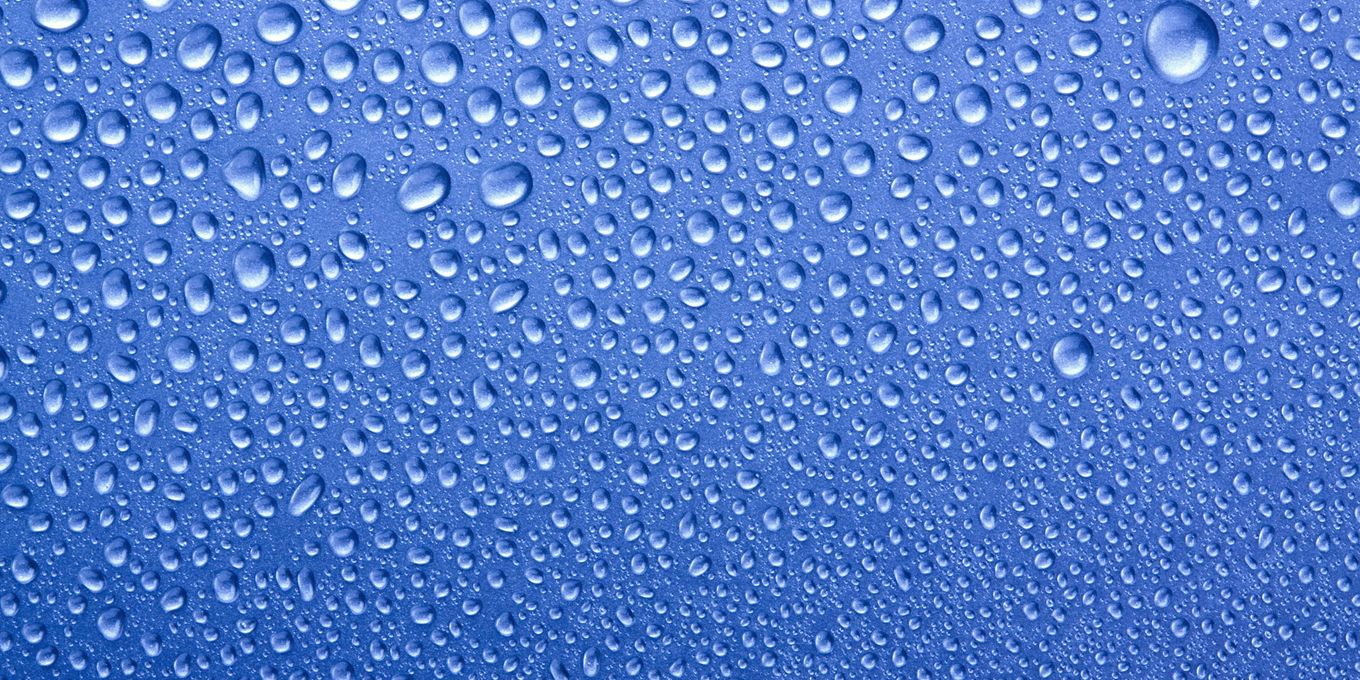 Drops of water on a blue surface