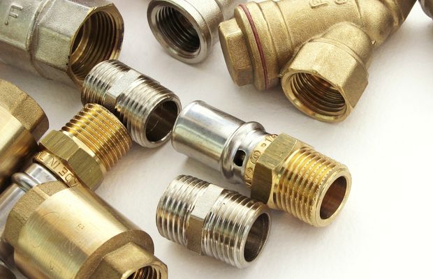 Brass and steel pipe fittings for joining water lines