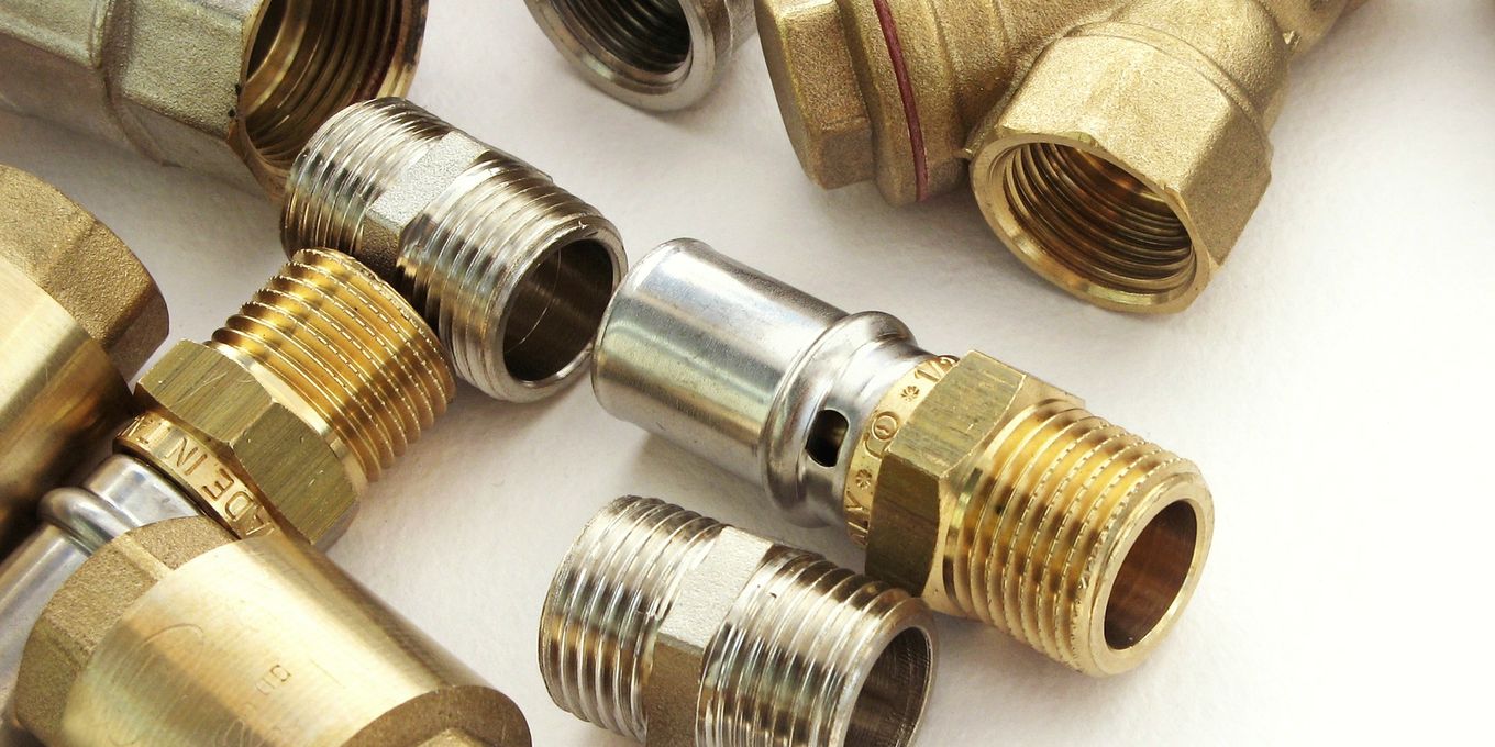 Brass and steel pipe fittings for joining water lines